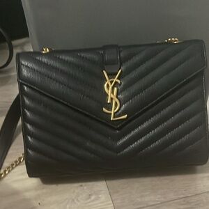 YSL mid cross back.